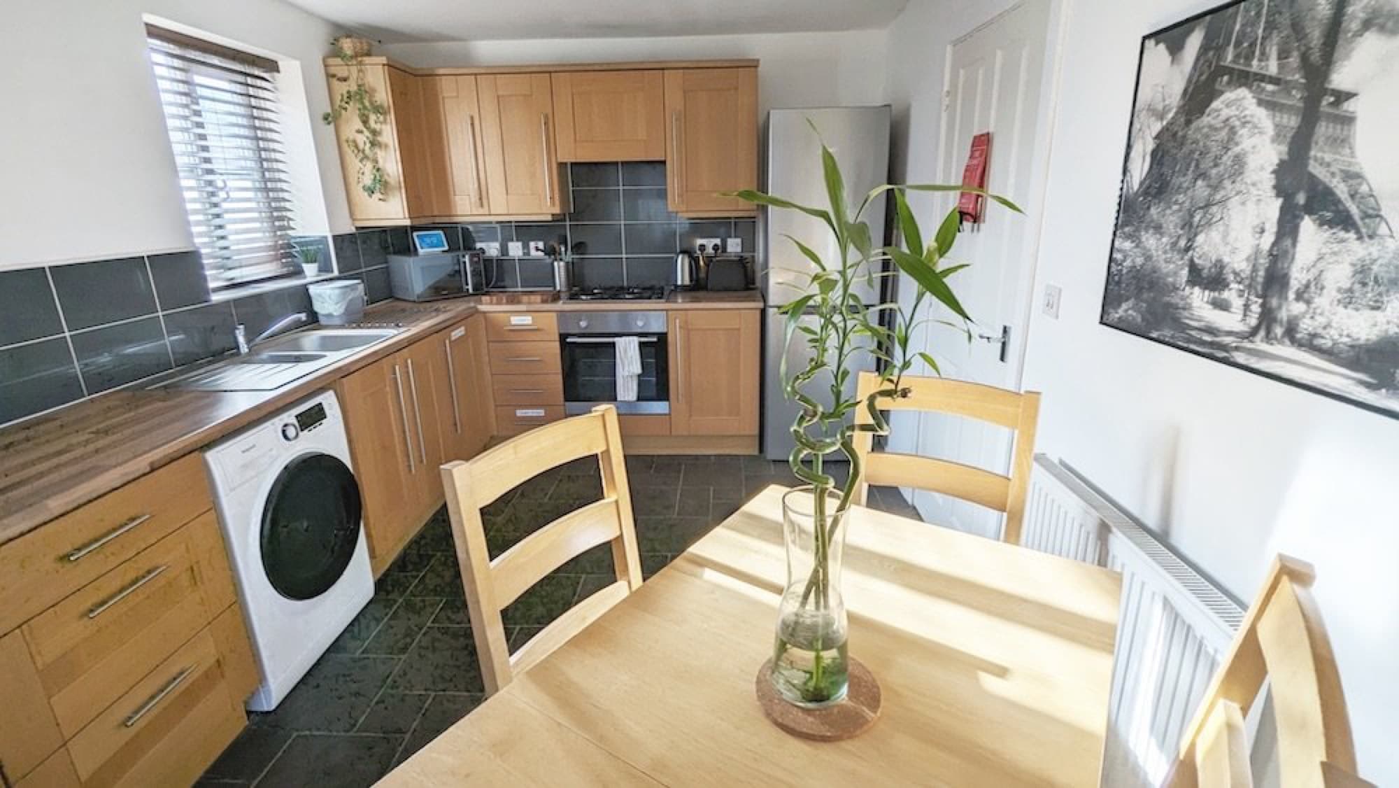 Airbnb kitchen with clean design and full appliances in Long Eaton